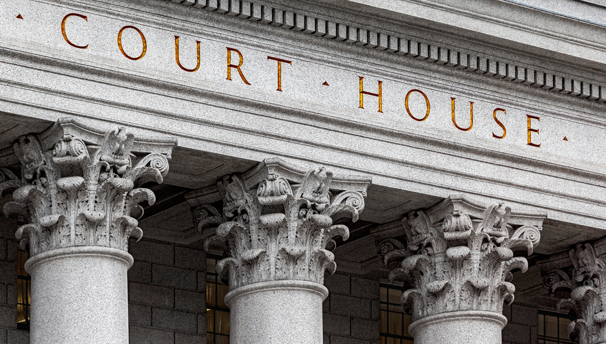 civil litigation at a courthouse pillar closeup column representing civil litigation practice offered by billings tubb and wright law firm